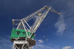 large port industrial crane on a clear sky background