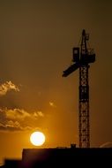 Crane Construction at the sunset