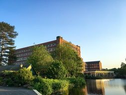 view from the river to large buildings