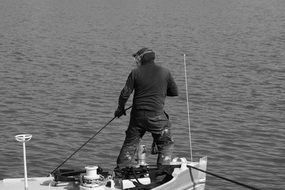 photo of a worker on a boat in the port of Hamburg