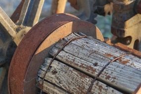 old metal and wooden wheel