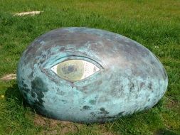 large pebbles with a painted eye