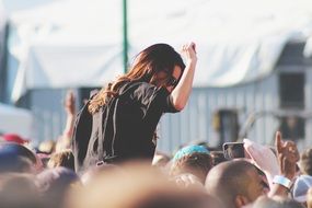 girl dancing at a concert