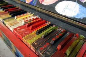 multicolored piano keys close up