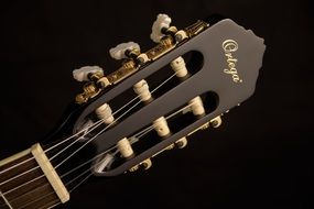 guitar fretboard on black background
