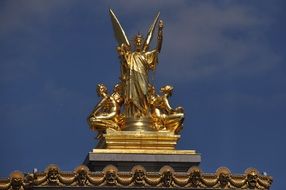 golden liberty sculpture on the roof of the Opera Garnier, france, Paris