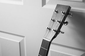 Black and white picture of acoustic guitar