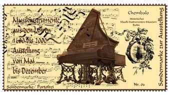 old postage stamp with the image of a piano