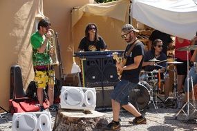 hippie street musicians on a sunny day