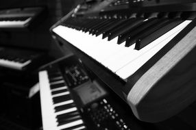 black and white piano keyboard in the studio