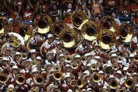 College Brass Band performing on football stadium