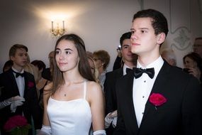 girl with a young man at a school ball