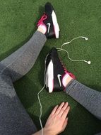 picture of Girl legs in sport leggings and black shoes