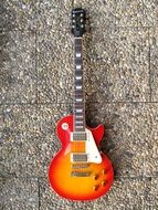 orange red electric guitar