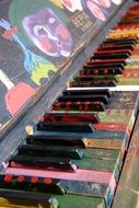 bright multicolored piano keys side view