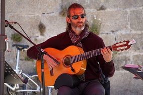 guitarist in sunglasses