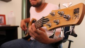 Man playing on a guitar