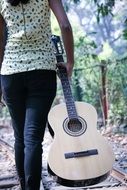 girl with an acoustic guitar