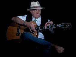 Guitar Player in hat