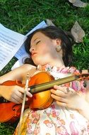 Violin and girl sleeping