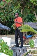 man playing saxophone in jamaica