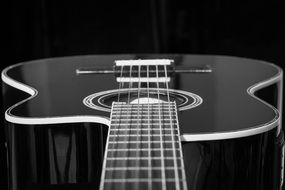 Black acoustic Guitar close-up