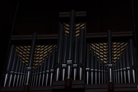 black organ pipes in a church