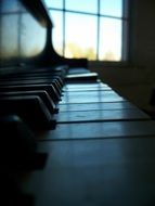 piano keys in the evening lights