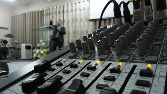 Table of Sound Mixer and Pastor in Church