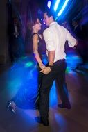 couple on a bright dance floor