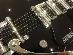 Black Gretsch Electric Guitar, fragment