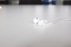 in-ear white headphones