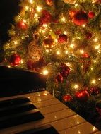 Christmas tree near the piano