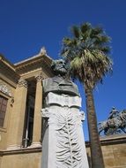 bust of Giuseppe Verdi in front of the Palermo Theater