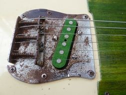 guitar with rusty bridge