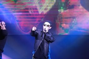 korean singer sings a song on stage