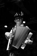 black and white image of an accordionist