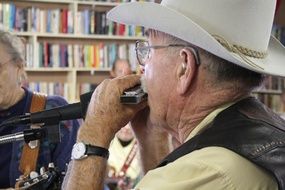 old country musicians in the library hall