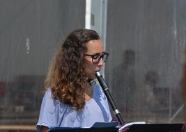 young woman plays Clarinet