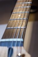 blurred strings of electric guitar