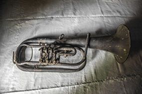 old rusty trumpet top view