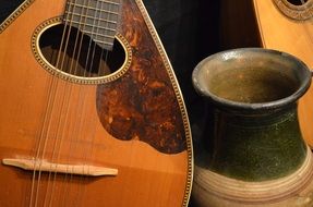 pottery and string instrument
