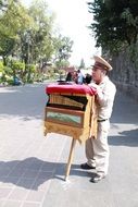 Organ grinder in park