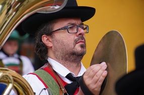 portrait of a musician with glasses