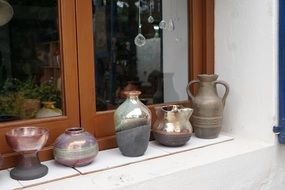 beautiful vases on the windowsill