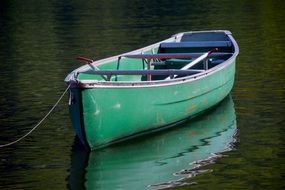 green wooden boat