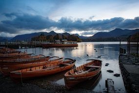 boats in the harbor of a large lake