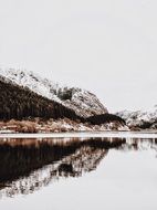 snowy mountains in autumn day