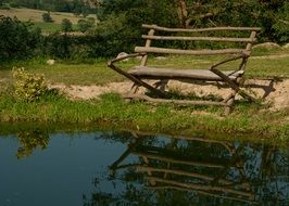 wooden bench by the lake