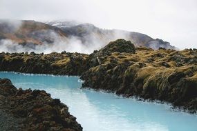 river near rocky hills